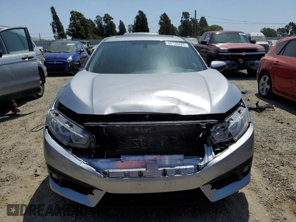 2017 Honda Civic EX-L z VIN 19XFC1F7XHE207946, wystawiony jako Copart lot #58730425 z przebiegiem 58 564 mil mil oraz Szkoda całkowita • Salvage title. Historia ofert i sprzedaży dostępna na DreamBid. Obrazek 5.