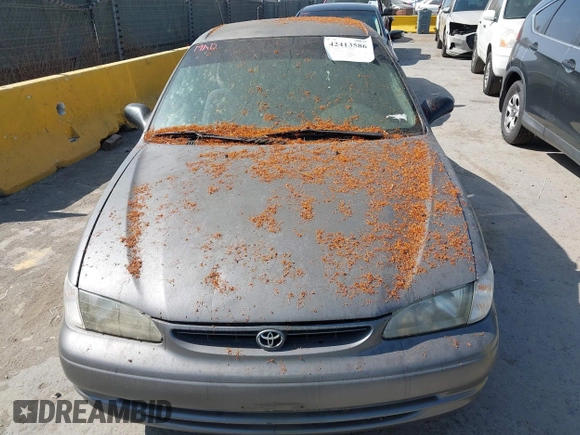 1999 Toyota Corolla VE z VIN 1NXBR12E5XZ237045, wystawiony jako IAAI lot #42413586 z przebiegiem Nie podano mil oraz . Historia ofert i sprzedaży dostępna na DreamBid. Obrazek 6.