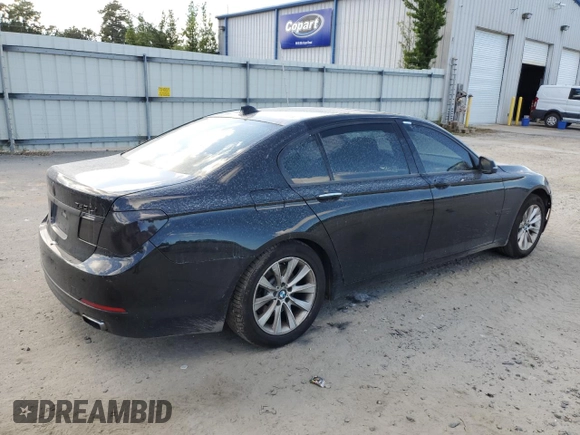 2015 BMW 7 Series 740Li with VIN WBAYE4C58FD138919, listed as a Copart auction lot 69409074 with 145,549 mi miles and Salvage Title. Bid and sale history available at DreamBid. Image 3.