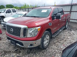 2017 Nissan Titan Platinum Reserve z VIN 1N6AA1E67HN506425, wystawiony jako IAAI lot #42147358 z przebiegiem 88 519 mil mil oraz . Historia ofert i sprzedaży dostępna na DreamBid. Obrazek 2.