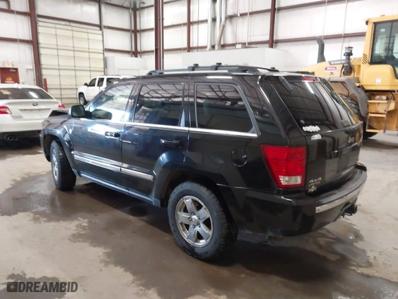 2007 Jeep Grand Cherokee Limited with VIN 1J8HR58287C572544, listed as a IAAI auction lot 41366475 with 231,151 mi miles. Bid and sale history available at carsss.com. Image 3.