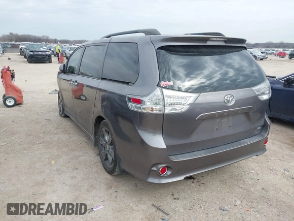 2015 Toyota Sienna SE with VIN 5TDXK3DC8FS652966, listed as a IAAI auction lot 41576611 with 108,858 mi miles and . Bid and sale history available at DreamBid. Image 3.