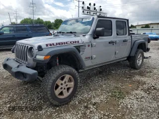 2020 Jeep Gladiator Rubicon с VIN 1C6JJTBG7LL102712, выставлен на аукционе Copart как лот 60887965 с пробегом 80 262 миль миль и Списание • Salvage title. История ставок и продаж доступна на DreamBid. Изображение 1.