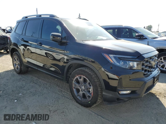 2024 Honda Passport TrailSport z VIN 5FNYF8H67RB010869, wystawiony jako Copart lot #50761425 z przebiegiem 5 720 mil mil oraz Szkoda całkowita • Salvage title. Historia ofert i sprzedaży dostępna na DreamBid. Obrazek 4.