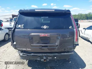 2015 GMC Yukon XL SLT z VIN 1GKS2HKC6FR122234, wystawiony jako IAAI lot #42325984 z przebiegiem 241 008 mil mil oraz . Historia ofert i sprzedaży dostępna na DreamBid. Obrazek 17.