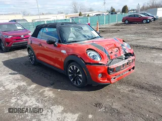 2021 MINI Convertible Cooper S z VIN WMWWJ5C09M3M08577, wystawiony jako IAAI lot #41469351 z przebiegiem 51 145 mil mil oraz . Historia ofert i sprzedaży dostępna na DreamBid. Obrazek 1.