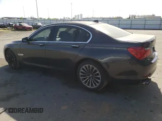 2012 BMW 7 Series 740i with VIN WBAKA4C54CC613419, listed as a Copart auction lot 54420885 with 104,006 mi miles and Salvage Title. Bid and sale history available at carsss.com. Image 2.