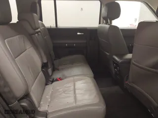 2016 Ford Flex SEL with VIN 2FMGK5C87GBA03604, listed as a IAAI auction lot 41345702 with 125,424 mi miles. Bid and sale history available at carsss.com. Image 8.