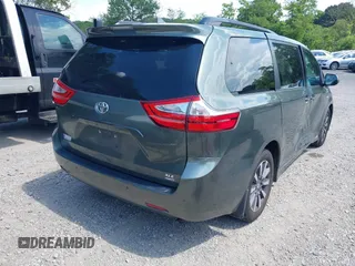 2018 Toyota Sienna XLE with VIN 5TDDZ3DC4JS189540, listed as a IAAI auction lot 42594973 with 103,374 mi miles and . Bid and sale history available at DreamBid. Image 4.