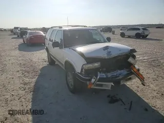 1998 Chevrolet Blazer LS z VIN 1GNDT13W9W2147761, wystawiony jako Copart lot #47551835 z przebiegiem 211 761 mil mil oraz Szkoda całkowita • Salvage title. Historia ofert i sprzedaży dostępna na DreamBid. Obrazek 12.