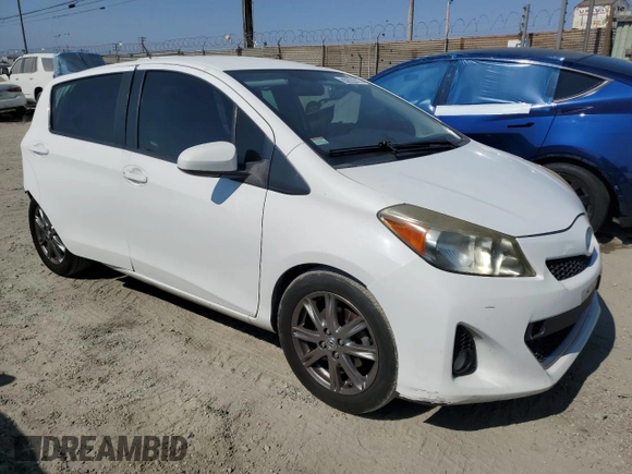 2012 Toyota Yaris L with VIN JTDKTUD30CD527531, listed as a Copart auction lot 65022015 with 157,177 mi miles and Salvage title. Bid and sale history available at DreamBid. Image 4.