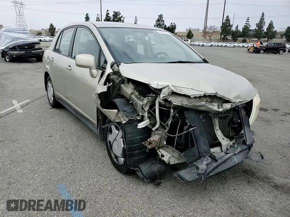 2009 Nissan Versa S with VIN 3N1BC11E79L433933, listed as a Copart auction lot 54953675 with 196,785 mi miles and Salvage Title. Bid and sale history available at DreamBid. Image 14.