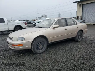 1994 Toyota Camry XLE with VIN JT2GK13E4R0053523, listed as a Copart auction lot 46646995 with 172,091 mi miles and Salvage Title. Bid and sale history available at carsss.com. Image 1.