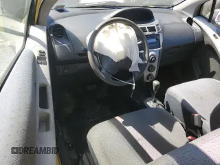 2009 Toyota Yaris with VIN JTDJT903195276164, listed as a Copart auction lot 50129115 with 165,824 mi miles and Salvage Title. Bid and sale history available at carsss.com. Image 8.