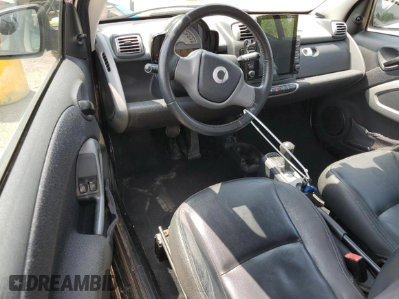 2010 Smart fortwo Pure с VIN WMEEJ3BA4AK399691, выставлен на аукционе Copart как лот 60283245 с пробегом 172 584 миль миль и Чистый • Clean title. История ставок и продаж доступна на DreamBid. Изображение 8.