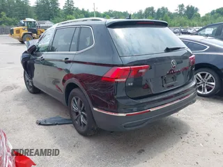 2022 Volkswagen Tiguan SE with VIN 3VV2B7AXXNM060140, listed as a IAAI auction lot 40300638 with 25,955 mi miles and . Bid and sale history available at DreamBid. Image 3.