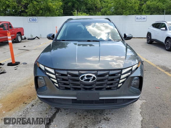 2023 Hyundai Tucson SEL with VIN 5NMJBCAEXPH209637, listed as a Copart auction lot 63222495 with 62,009 mi miles and Clean title. Bid and sale history available at DreamBid. Image 5.