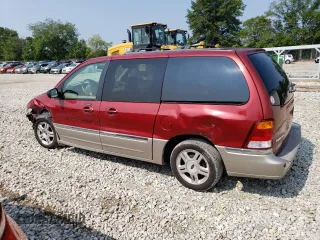 2003 Ford Windstar SEL with VIN 2FMZA534X3BA87386, listed as a Copart auction lot 63076564 with 199,075 mi miles and Salvage Title. Bid and sale history available at carsss.com. Image 2.