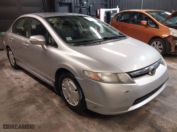 2008 Honda Civic Hybrid with VIN JHMFA36248S029064, listed as a IAAI auction lot 42029638 with 95,339 mi miles. Bid and sale history available at carsss.com. Image 1.