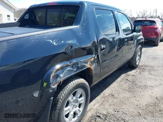 2007 Honda Ridgeline RTL w/Leather with VIN 2HJYK165X7H548322, listed as a IAAI auction lot 41983105 with 152,292 mi miles. Bid and sale history available at carsss.com. Image 13.