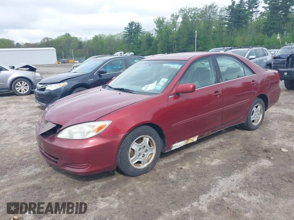 2003 Toyota Camry LE z VIN 4T1BF32K63U050174, wystawiony jako IAAI lot #42260843 z przebiegiem 210 486 mil mil oraz . Historia ofert i sprzedaży dostępna na DreamBid. Obrazek 2.
