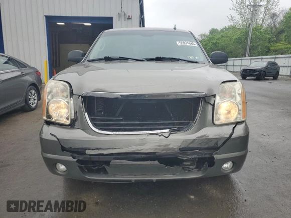 2007 GMC Yukon SLT with VIN 1GKFK13007J117446, listed as a Copart auction lot 55974665 with 204,785 mi miles and Salvage title. Bid and sale history available at DreamBid. Image 5.