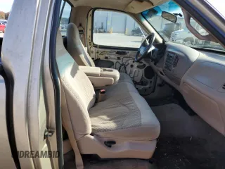 1999 Ford F-150 XL с VIN 1FTRF17L2XKA36749, выставлен на аукционе Copart как лот 84671444 с пробегом 148 338 миль миль и Списание • Salvage title. История ставок и продаж доступна на DreamBid. Изображение 10.