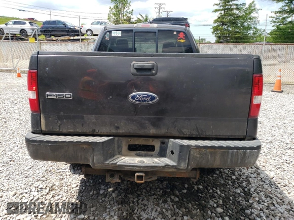 2006 Ford F-150 STX with VIN 1FTRX14W36NB54625, listed as a Copart auction lot 58221215 with 219,195 mi miles and Salvage title. Bid and sale history available at DreamBid. Image 6.