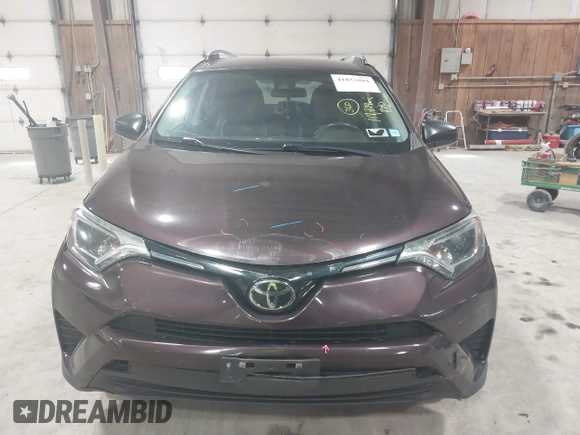 2018 Toyota RAV4 LE with VIN 2T3BFREV0JW759714, listed as a IAAI auction lot 41823084 with 119,909 mi miles and . Bid and sale history available at DreamBid. Image 12.