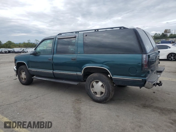 1999 Chevrolet Suburban with VIN 1GNFK16R9XJ516000, listed as a Copart auction lot 73854994 with 263,079 mi miles and Salvage Title. Bid and sale history available at carsss.com. Image 2.