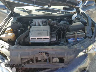 1997 Lexus ES 300 Luxury Sport Sdn with VIN JT8BF22G0V0048360, listed as a Copart auction lot 77594284 with 104,072 mi miles and Salvage Title. Bid and sale history available at carsss.com. Image 11.
