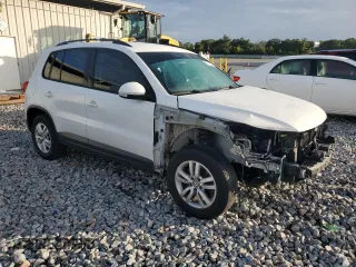 2017 Volkswagen Tiguan S with VIN WVGAV7AX3HK039090, listed as a Copart auction lot 60723615 with 72,311 mi miles and Salvage title. Bid and sale history available at DreamBid. Image 4.