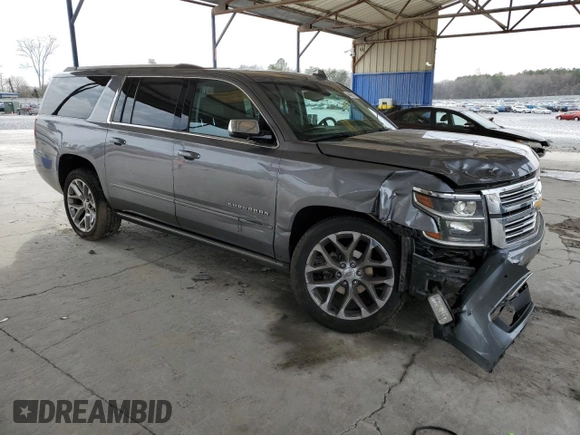 2018 Chevrolet Suburban Premier with VIN 1GNSCJKC1JR203318, listed as a Copart auction lot 44690745 with 120,137 mi miles and Salvage title. Bid and sale history available at DreamBid. Image 4.
