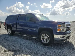 2014 Chevrolet Silverado 1500 LT with VIN 1GCRCREH7EZ118874, listed as a Copart auction lot 51584125 with 179,030 mi miles and Salvage Title. Bid and sale history available at DreamBid. Image 4.