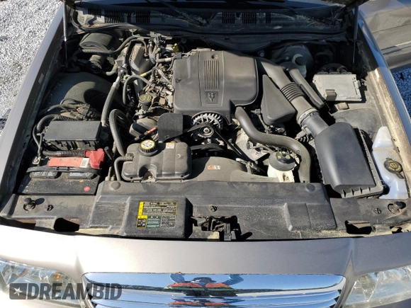 2005 Ford Crown Victoria LX z VIN 2FAFP74WX5X166506, wystawiony jako Copart lot #52141265 z przebiegiem 117 686 mil mil oraz Szkoda całkowita • Salvage title. Historia ofert i sprzedaży dostępna na DreamBid. Obrazek 12.