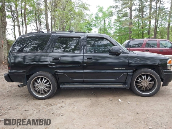 2005 GMC Yukon Denali z VIN 1GKEK63U65J182925, wystawiony jako IAAI lot #42071053 z przebiegiem 235 367 mil mil oraz . Historia ofert i sprzedaży dostępna na DreamBid. Obrazek 13.