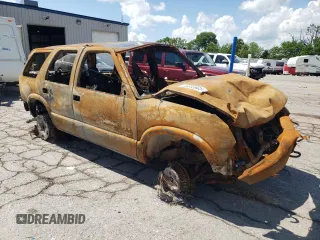 2004 Chevrolet Blazer LS z VIN 1GNDT13X24K141323, wystawiony jako Copart lot #56503905 z przebiegiem Nie podano mil oraz Nie do naprawy • Non repairable. Historia ofert i sprzedaży dostępna na DreamBid. Obrazek 4.