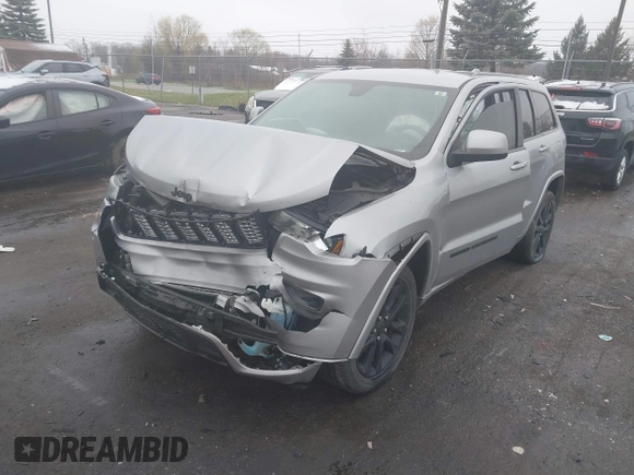 2017 Jeep Grand Cherokee Laredo with VIN 1C4RJFAG2HC927028, listed as a IAAI auction lot 41998255 with 109,569 mi miles and . Bid and sale history available at DreamBid. Image 2.