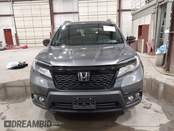 2019 Honda Passport Touring with VIN 5FNYF8H98KB007933, listed as a IAAI auction lot 41953263 with 87,614 mi miles and . Bid and sale history available at DreamBid. Image 12.