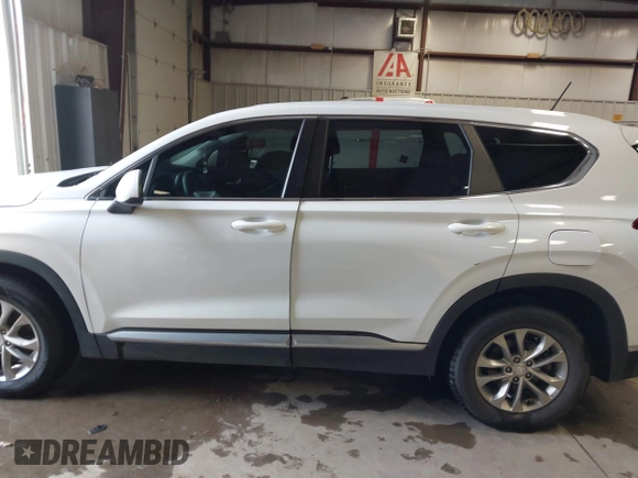 2019 Hyundai Santa Fe SE with VIN 5NMS23AD1KH063472, listed as a IAAI auction lot 41375650 with 64,496 mi miles and . Bid and sale history available at DreamBid. Image 15.