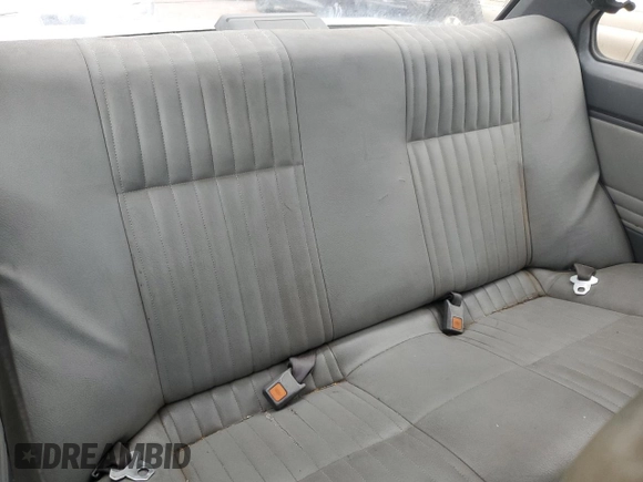 1987 Nissan Sentra z VIN JN1PB2210HU557007, wystawiony jako Copart lot #68174784 z przebiegiem 150 316 mil mil oraz Czysty tytuł • Clean title. Historia ofert i sprzedaży dostępna na DreamBid. Obrazek 10.