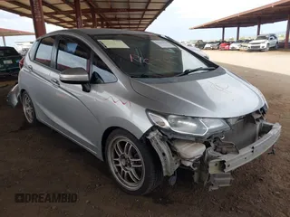 2015 Honda Fit LX with VIN 3HGGK5G52FM764205, listed as a IAAI auction lot 42641420 with 104,783 mi miles and . Bid and sale history available at DreamBid. Image 1.
