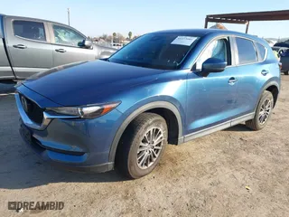 2019 Mazda CX-5 Touring with VIN JM3KFACM1K0517958, listed as a IAAI auction lot 41473681 with NaN miles. Bid and sale history available at carsss.com. Image 17.