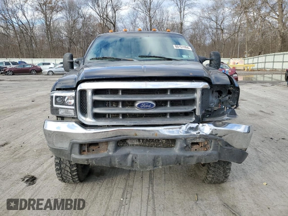 2000 Ford F-250 with VIN 1FTNF21S9YEA14056, listed as a Copart auction lot 80151994 with 165,477 mi miles and Salvage title. Bid and sale history available at DreamBid. Image 5.