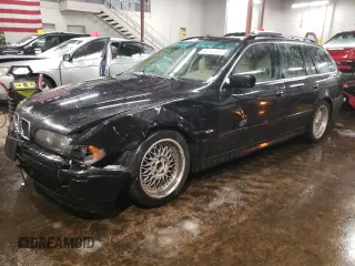 2003 BMW 5 Series 525iAT with VIN WBADS43443GE11057, listed as a Copart auction lot 44243155 with 174,926 mi miles and Salvage Title. Bid and sale history available at carsss.com. Image 1.
