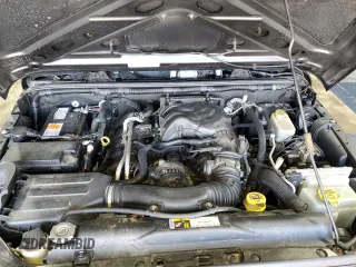 2016 Jeep Wrangler Sport z VIN 1C4GJWAG1GL192158, wystawiony jako Copart lot #53303845 z przebiegiem 99 812 mil mil oraz Szkoda całkowita • Salvage title. Historia ofert i sprzedaży dostępna na DreamBid. Obrazek 11.