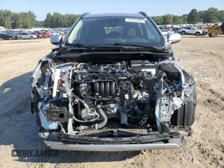 2022 Toyota Corolla Cross LE with VIN 7MUCAAAG0NV010646, listed as a Copart auction lot 72151744 with 59,273 mi miles and Salvage title. Bid and sale history available at DreamBid. Image 5.