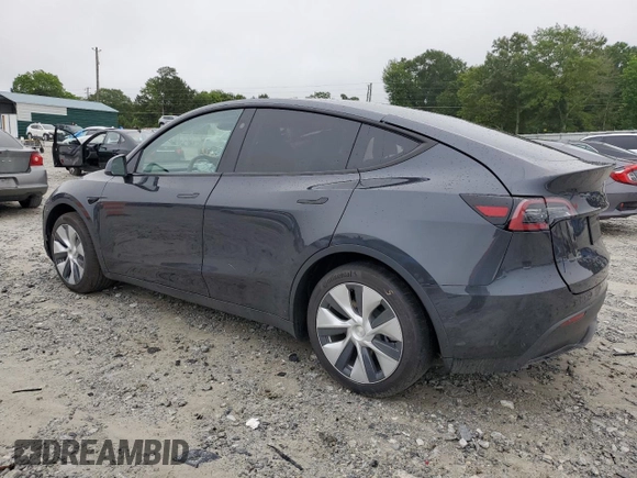 2024 Tesla Model Y Long Range with VIN 7SAYGAEE7RF005786, listed as a Copart auction lot 58415195 with 8,700 mi miles and Salvage title. Bid and sale history available at DreamBid. Image 2.