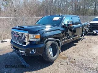 2019 GMC Sierra 2500HD Denali with VIN 1GT12SEY3KF207121, listed as a IAAI auction lot 38782753 with 87,337 mi miles. Bid and sale history available at carsss.com. Image 20.