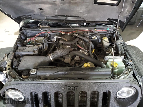 2009 Jeep Wrangler Unlimited Rubicon with VIN 1J8GA69179L756441, listed as a Copart auction lot 52111435 with 157,818 mi miles and Salvage title. Bid and sale history available at DreamBid. Image 12.